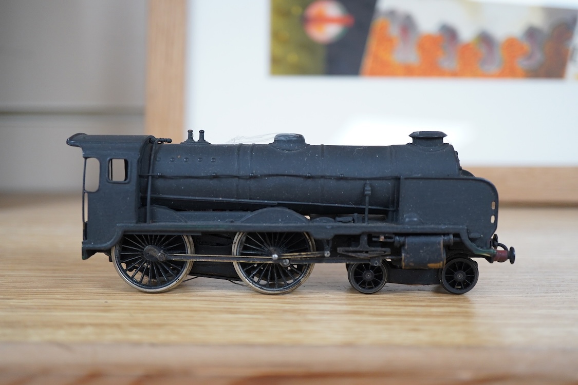 Three part-built 0 gauge railway brass and white metal locomotives by John Worsley; an ACE Products kit of an SR Bullied light Pacific with its original box, a SECR Wainwright H class 0-4-4T locomotive and an LNER class